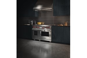 Wolf Dual Fuel Range and Pro Wall Hood featured at Food is Art International