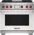 Wolf 36&quot; 4 Burner Dual Fuel Range with Infrared Griddle (DF36450G/WH/P) featuring white accent colored door and signature red Wolf knobs.