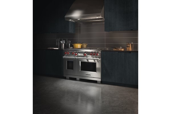 Wolf Dual Fuel Range and Pro Wall Hood featured at Food is Art International
