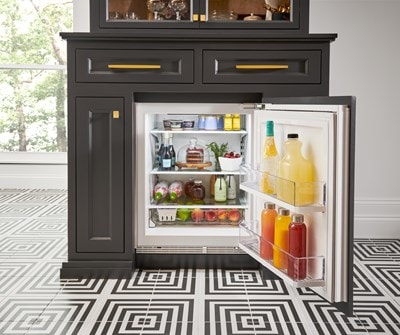 Shelves full of an assortment of foods and drinks in Sub-Zero 24" Designer Undercounter ADA Height Refrigerator - Panel Ready (DEU2450R/ADA)