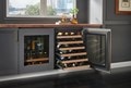 Sub-Zero 24" Designer Undercounter ADA Height Wine Storage - Panel Ready (DEU2450W/ADA) with wine racks extended at increasing lengths from top to bottom