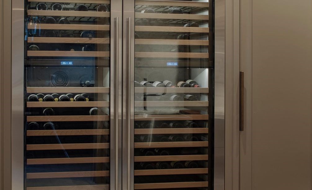 Sub-Zero 30" Designer Wine Storage in Low Country Modern kitchen by Laura Lee Samford.