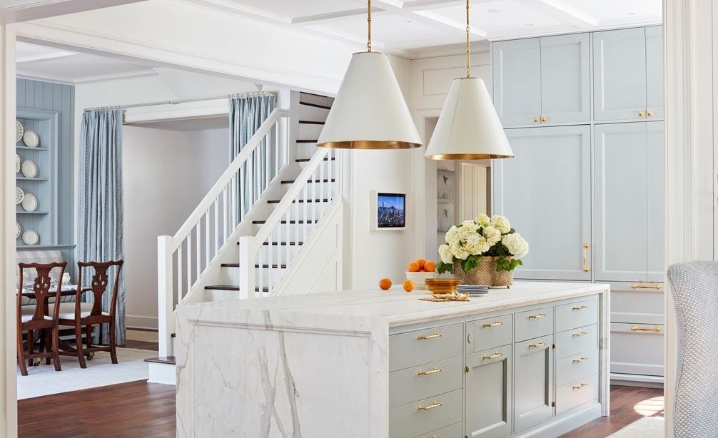 Waterfall marbel countertop island in Tradition with  a Pinch of Panache by Matthew Quinn.