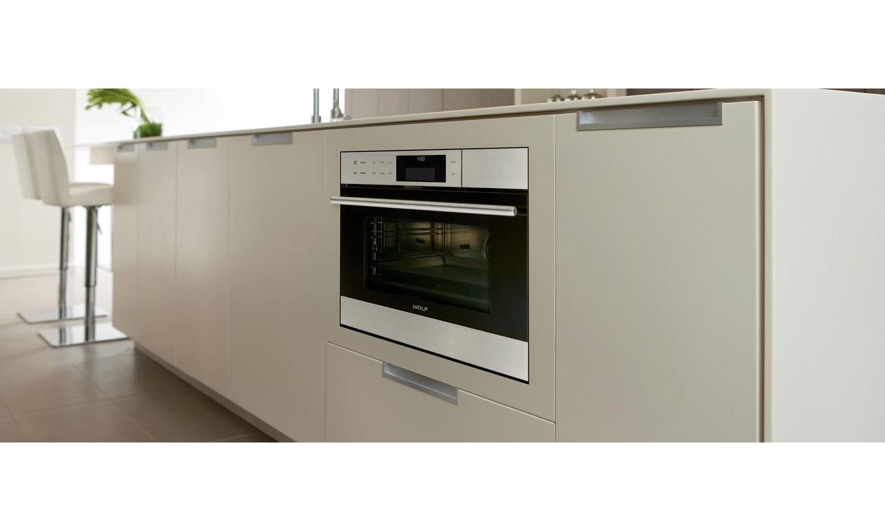 Wolf convection steam oven built-in next to Sub-Zero undercounter refrigeration