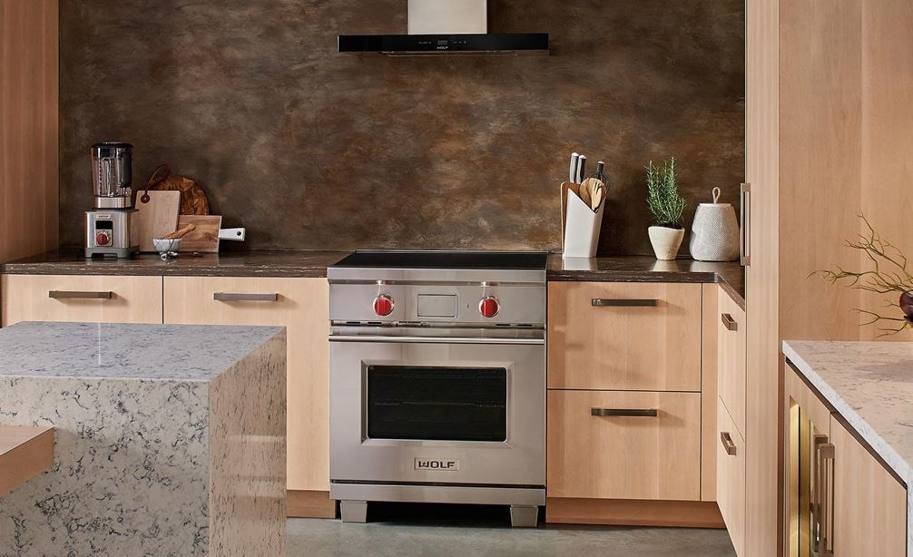 The Wolf 30&quot; Transitional Induction Range (IR304TE/S/TH) with Wolf 24&quot; E Series Transitional Convection Steam Oven (CSO24TE/S/TH)