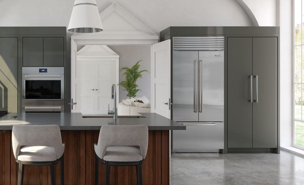 European style kitchen design featuring Wolf 30-inch E series Pro double oven and Sub-Zero 36-inch Classic French door refrigeration