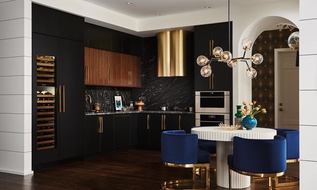 Modern high-rise custom kitchen design featuring Sub-Zero Designer Wine Storage, Wolf Contemporary Speed Oven and Cove Dishwasher