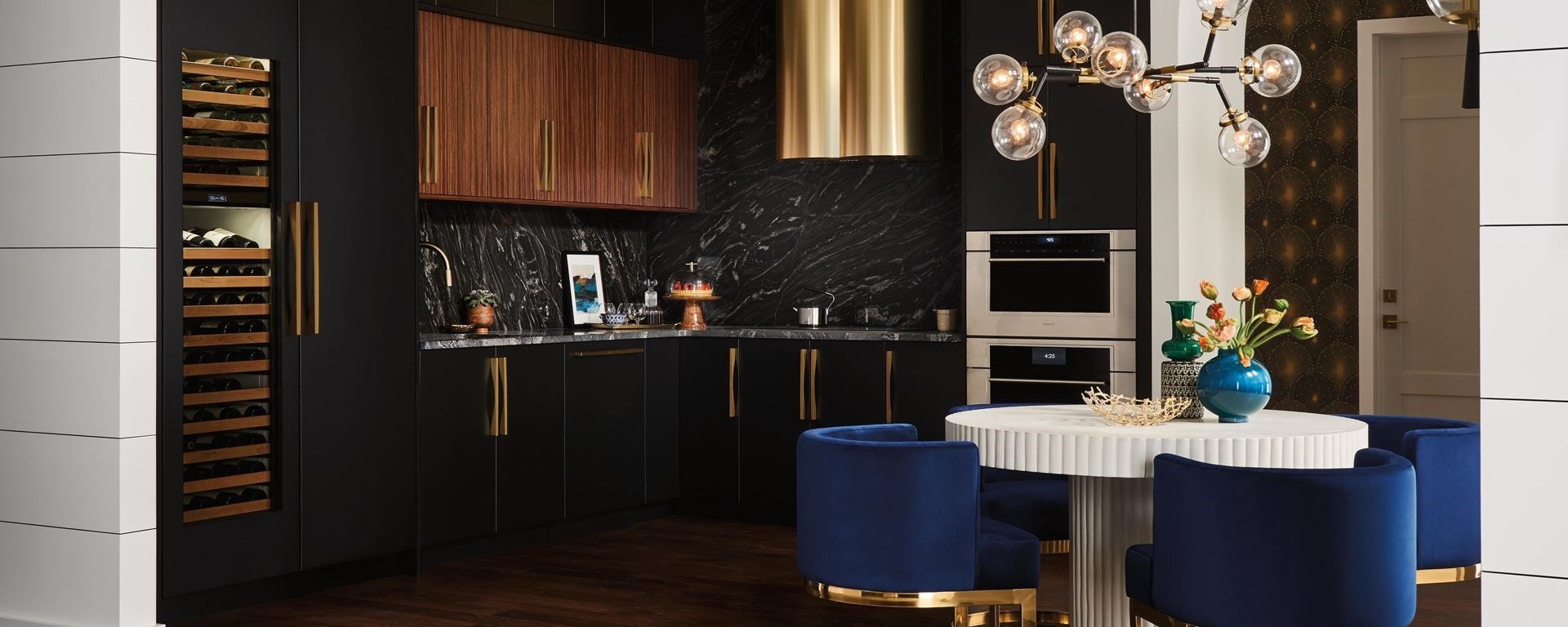Modern high-rise custom kitchen design featuring Sub-Zero Designer Wine Storage, Wolf Contemporary Speed Oven and Cove Dishwasher