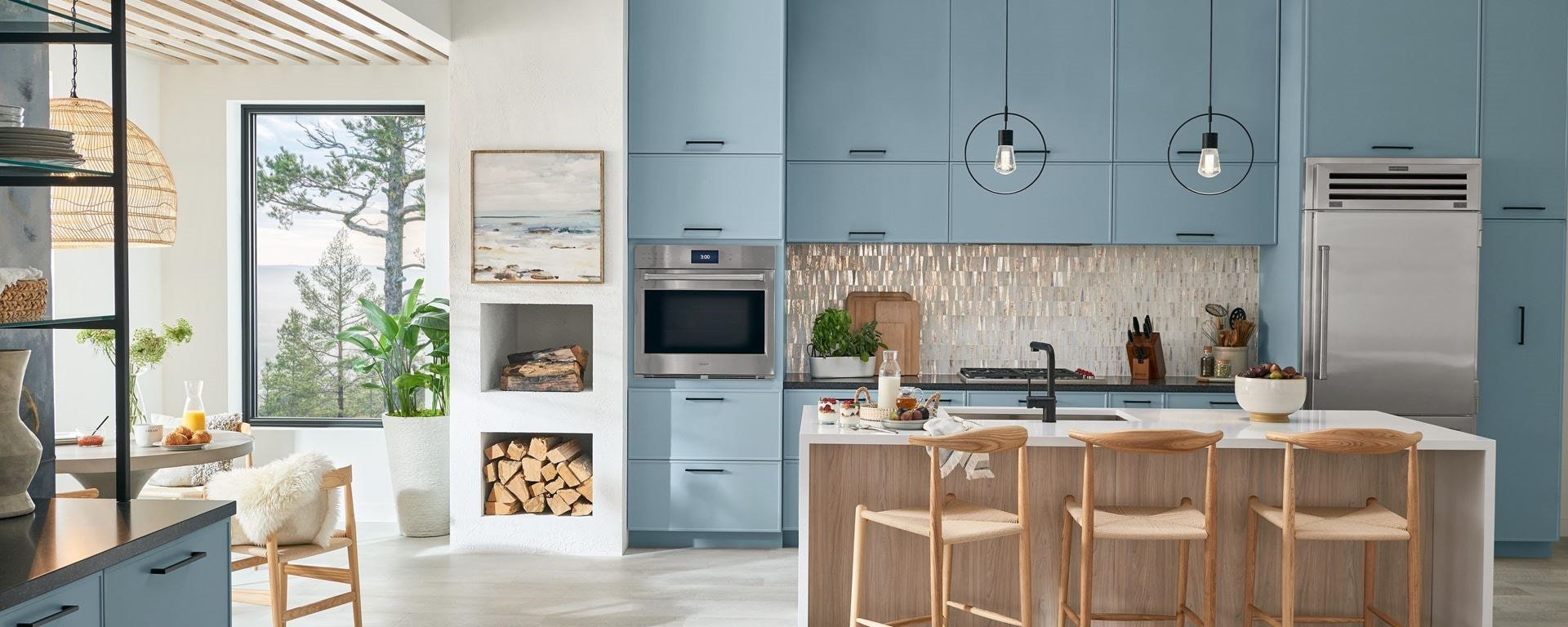 Custom Kitchen Design featuring Sub-Zero, Wolf, and Cove kitchen appliances set in modern slim shaker, denim and Swiss cabinetry