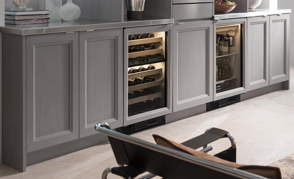 The Sub-Zero 24&quot; Undercounter Beverage Center Panel Ready (UC- 24BG/O) paired with 24&quot; Undercounter Wine Storage (424G/O)