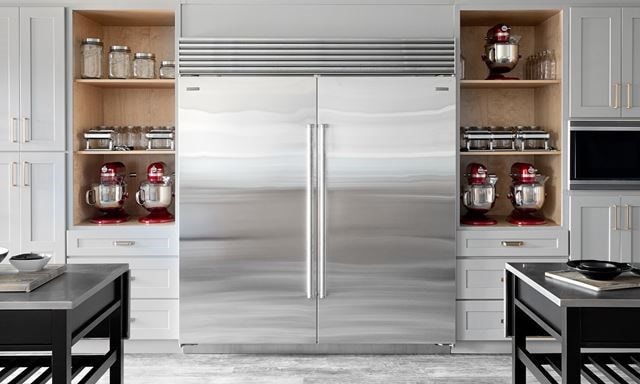 Professional Kitchen Design featuring Sub-Zero Refrigerators and Wolf Wall Ovens and Wolf Microwave