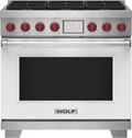 Wolf 36" 6 Burner Dual Fuel Range (DF36650/WH/P) featuring white accent colored door and signature red Wolf knobs.