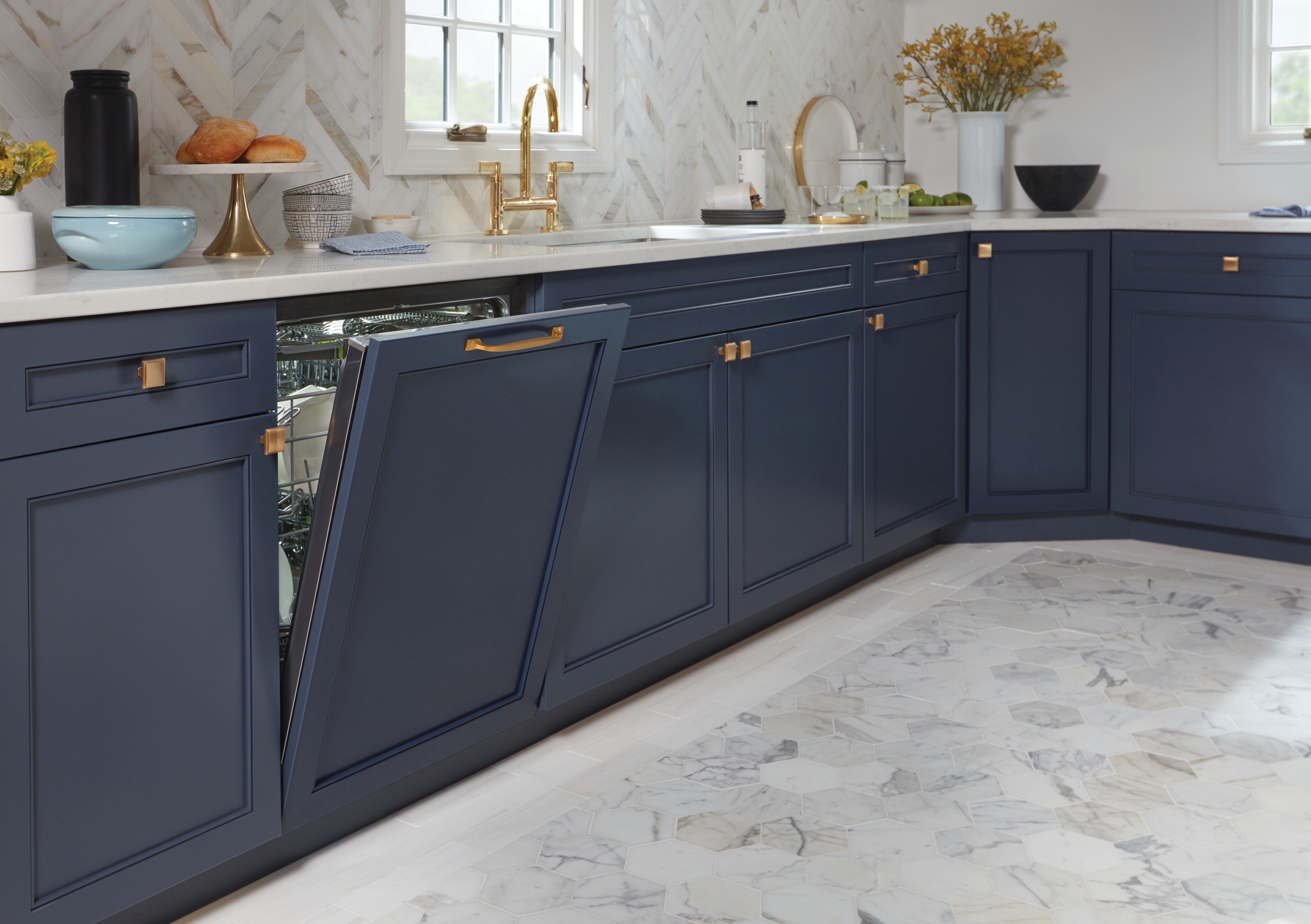 24 inch Panel Ready Dishwasher with Water Softener (DW2451WS) by Cove Dishwashers shown with custom deep blue panel matching kitchen cabinetry.