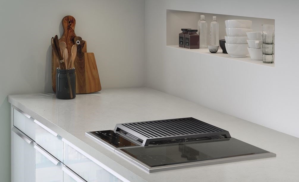 The Wolf 15&quot; Transitional Induction Cooktop (CI152TF/S) displayed in a clean bright minimalist kitchen design space
