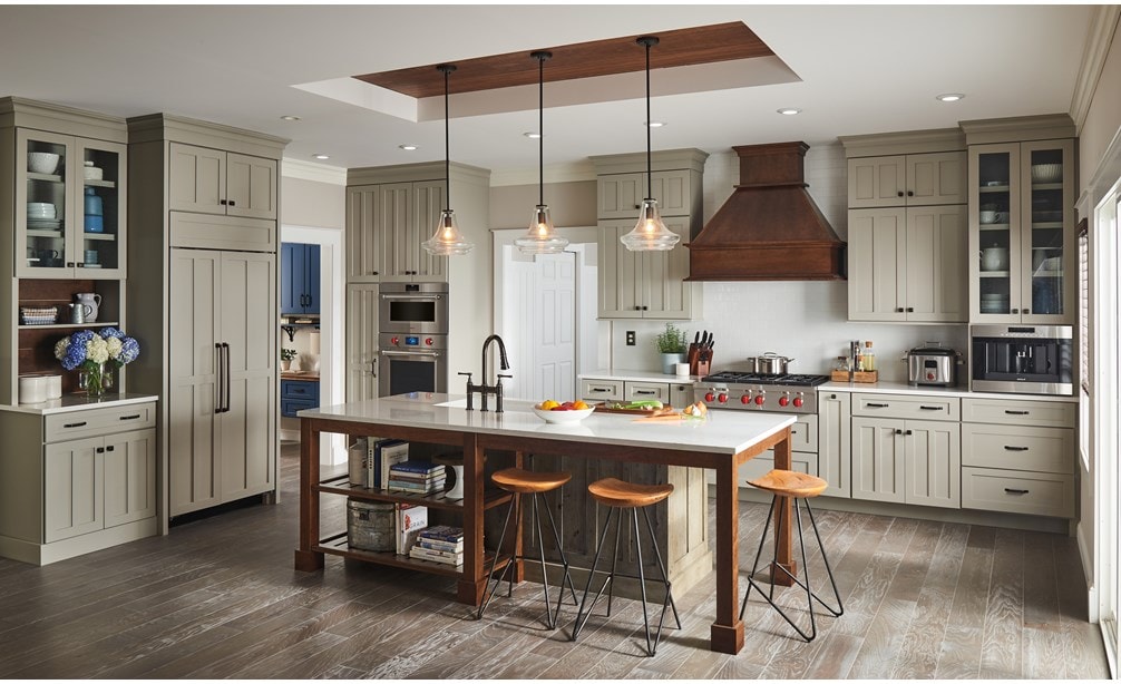 The Wolf 36" Sealed 6 Burner Rangetop (SRT366) is undeniably charming in this rustic style kitchen featuring farm table