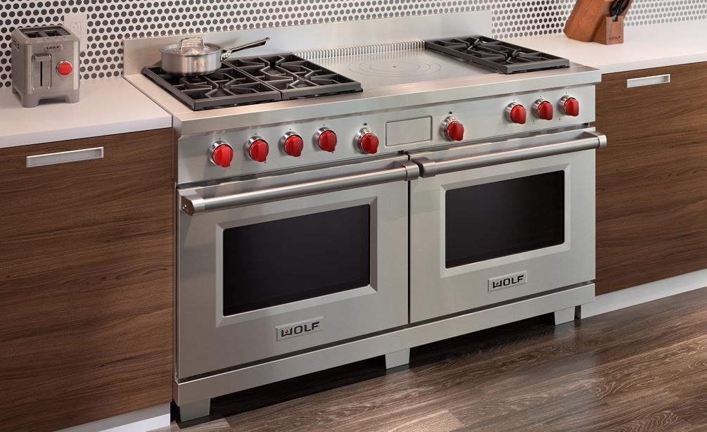 The Wolf 60&quot; Dual Fuel Range 6 Burner French Top (DF606F) shown with Wolf Two-Slice-Toaster with Red Knob (WGTR102S)