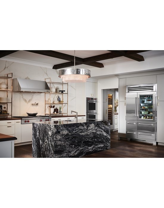 Sub-Zero 48 inch Pro Refrigerator and Freezer with Glass Door displayed in a custom kitchen design featuring large marble kitchen island