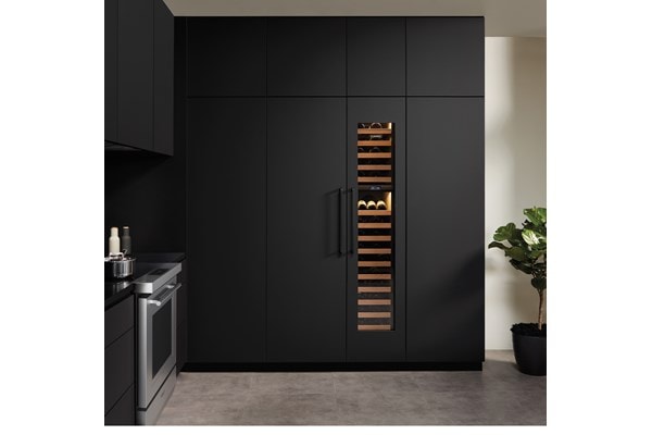 Sub-Zero Designer Series Refrigerator integrated into kitchen with black matte custom cabinetry