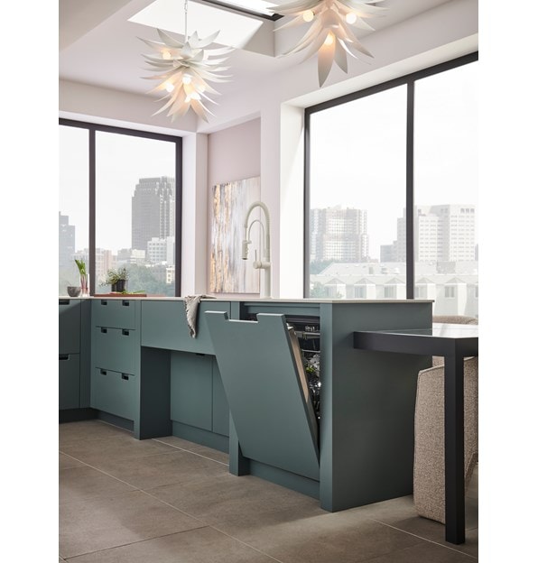 Cove panel ready dishwasher matched elegantly with the cabinetry in the kitchen.