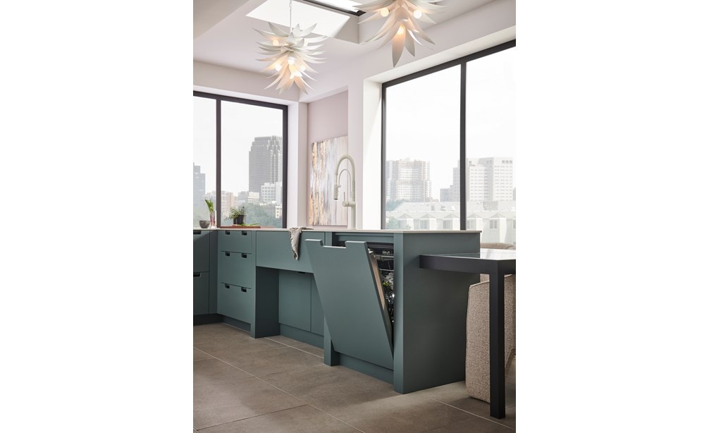 Cove panel ready dishwasher matched elegantly with the cabinetry in the kitchen.