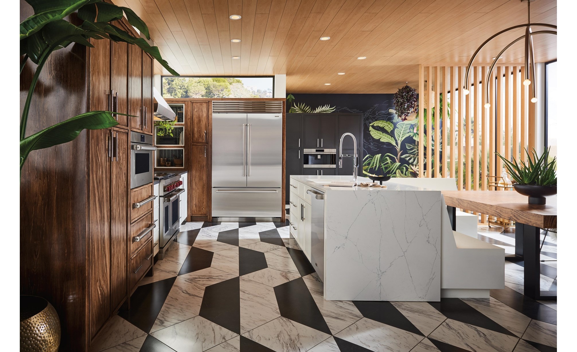 Sub-Zero Classic Series Refrigerator built into stained wood custom cabinetry in sunlit and earthy kitchen