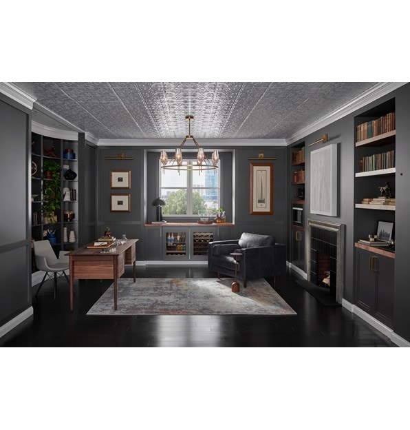 Sub-Zero 24" Designer Undercounter ADA Height Beverage Center - Panel Ready (DEU2450BG/ADA) shown in black custom cabinetry in dark home office 