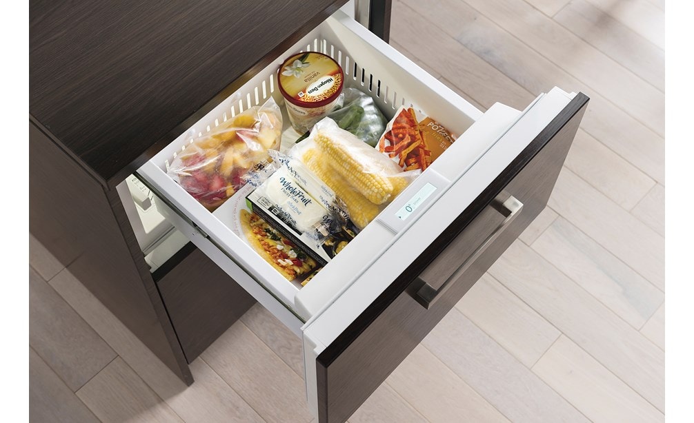 The Sub-Zero 24" Freezer Drawers with Ice Maker Panel Ready (ID-24FI) is compact yet can hold 3.8 cu. ft. of food in two storage drawers.