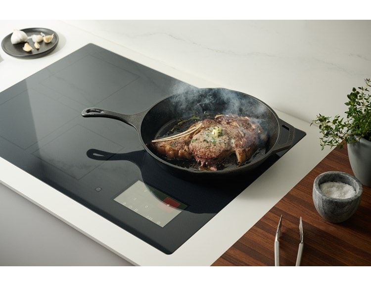Searing steak on 30-inch Induction Cooktop in cast iron skillet