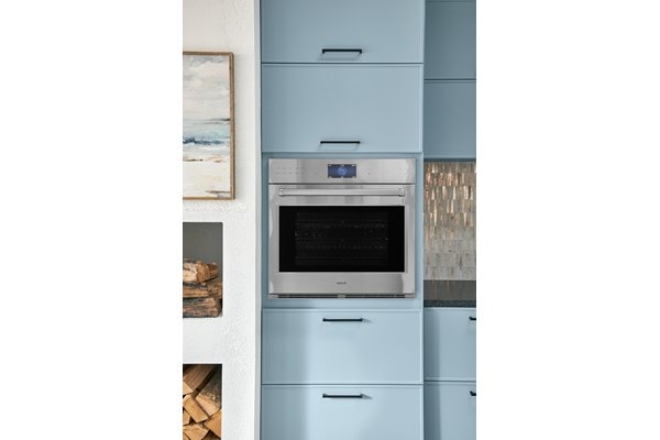 The new and enhanced Wolf E-Series Buil-In Wall Oven showing it's design friedly capabilities