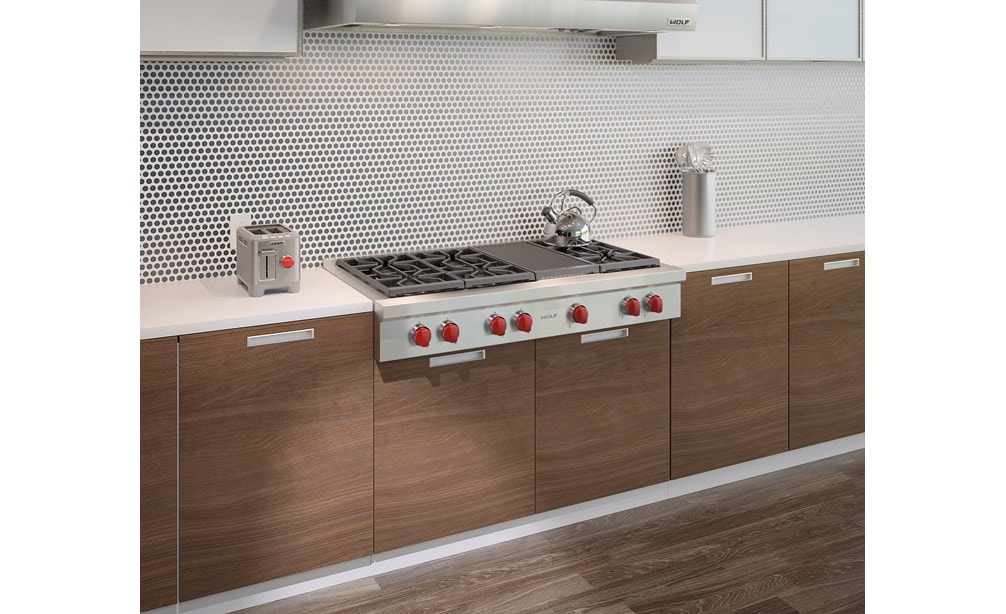 Wolf 48" Sealed 6 Burner Rangetop and Infrared Charbroiler (SRT486C) shown in a clean and sleek kitchen with streamlined surfaces