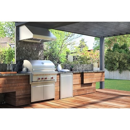 The Wolf 36" Outdoor Gas Grill (OG36) shown with Wolf Professional Grade Outdoor Ventilation Hood in this large outdoor kitchen. 