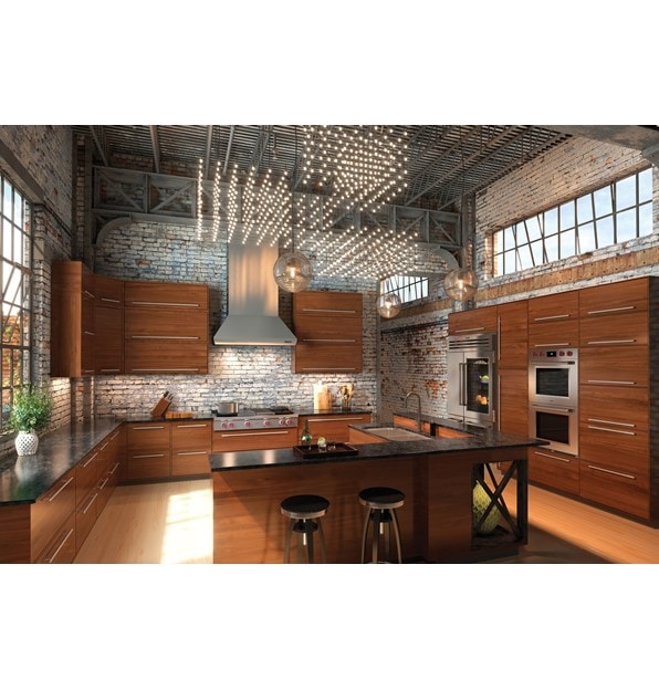 The Wolf 30" M Series Professional Double Oven (DO30PM/S/PH) shown integrated into an urban industrial kitchen design style