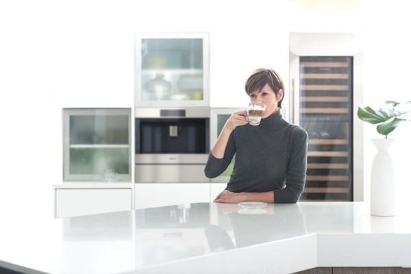 Craft and customize 15 professional-quality coffee drinks with a Wolf Built-In Coffee System