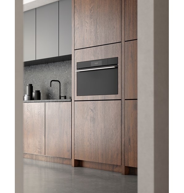 Wolf 30" M Series Contemporary Convection Steam Oven (CSO3050CM/B/T) displayed alongside stained wooden cabinetry shown through a doorway