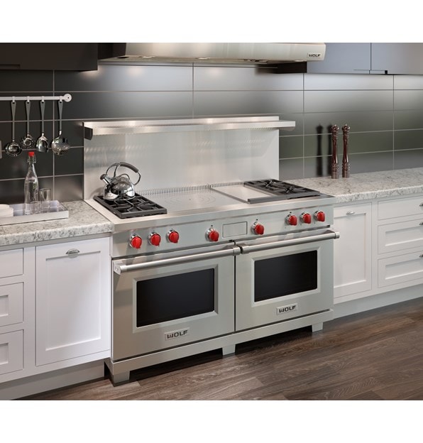 The Wolf 60" Dual Fuel Range 4 Burner Infrared Griddle French Top (DF604GF) with Wolf 60" Pro Wall Hood - 24" Depth (PW602418)