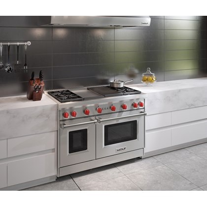 The Wolf 48" Gas Range 4 Burner Infrared Charbroiler Infrared Griddle (GR484CG) shown blending seamlessly into a sleek minimalist kitchen design