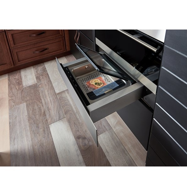 The Wolf 24" Vacuum Seal Drawer (VS24) shown adding power and performance in a traditional kitchen design