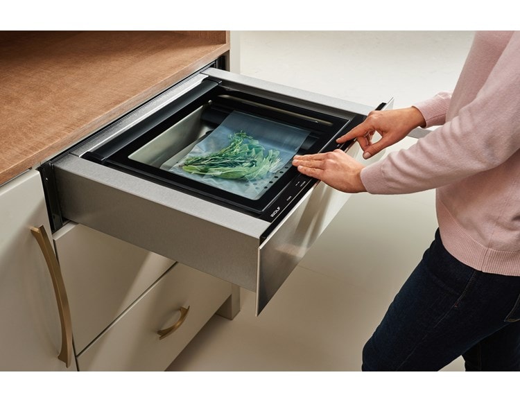 The Wolf 24" Vacuum Seal Drawer (VS24) adds the culinary tool professional chefs have enjoyed for years in any custom kitchen design