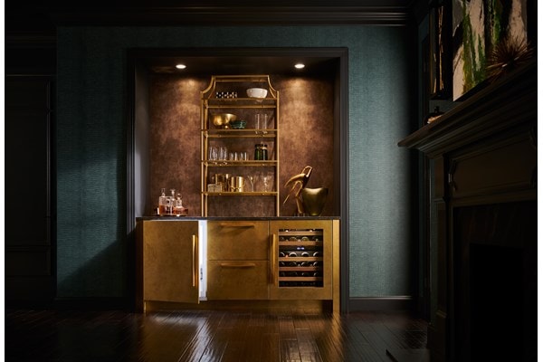 Stunning Sub-Zero 24" Undercounter Beverage Center paired with 24" Undercounter Wine Storage unit keeps beverages cold in any room of the house 