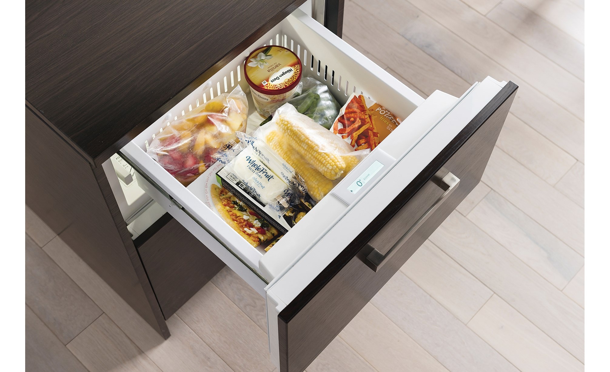 The Sub-Zero 24" Freezer Drawers with Ice Maker Panel Ready (ID-24FI) is compact yet can hold 3.8 cu. ft. of food in two storage drawers.