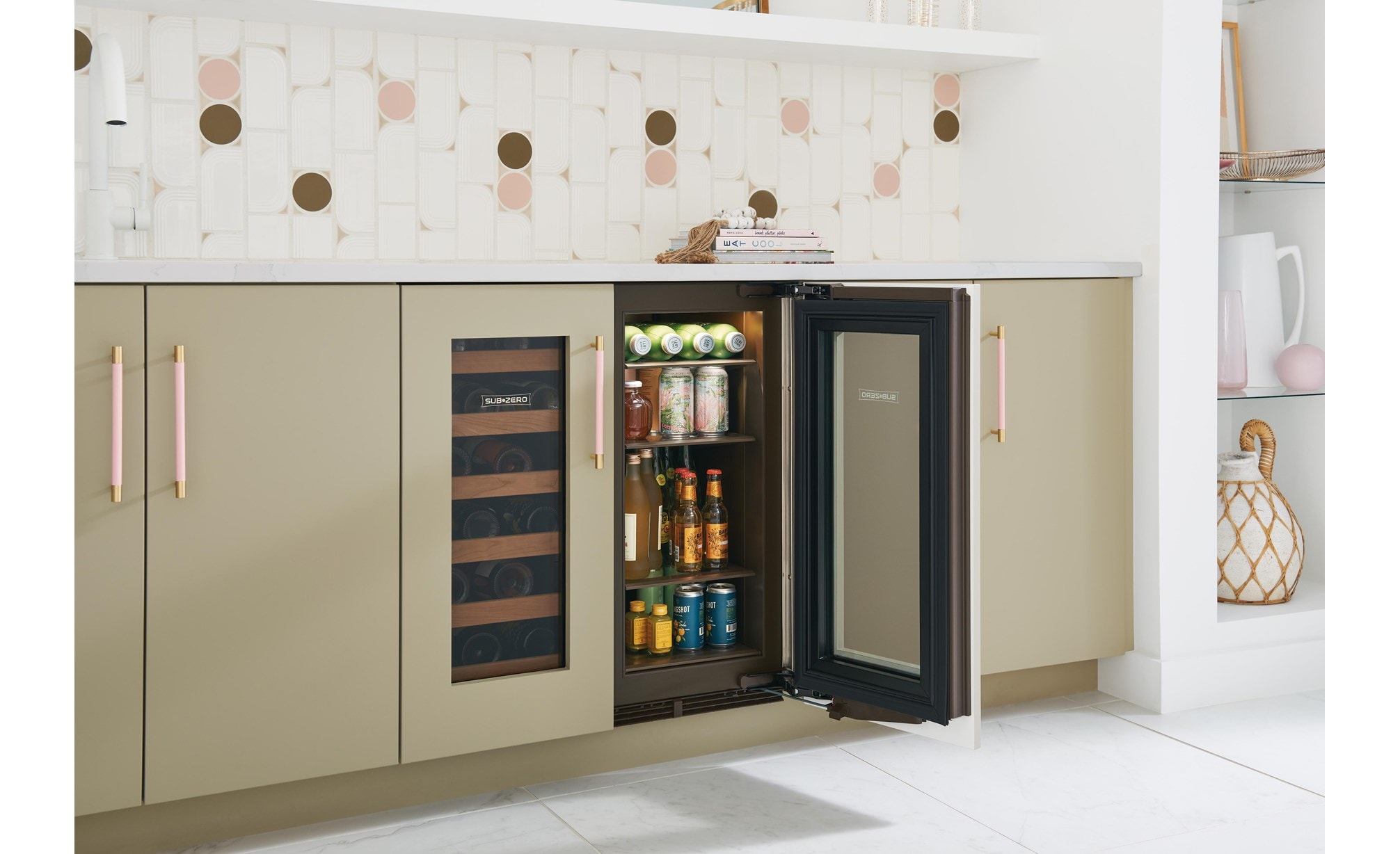 Side view of four full shelves stacked with an assortment of drinks in Sub-Zero 15" Designer Undercounter Beverage Center - Panel Ready (DEU1550BG) 