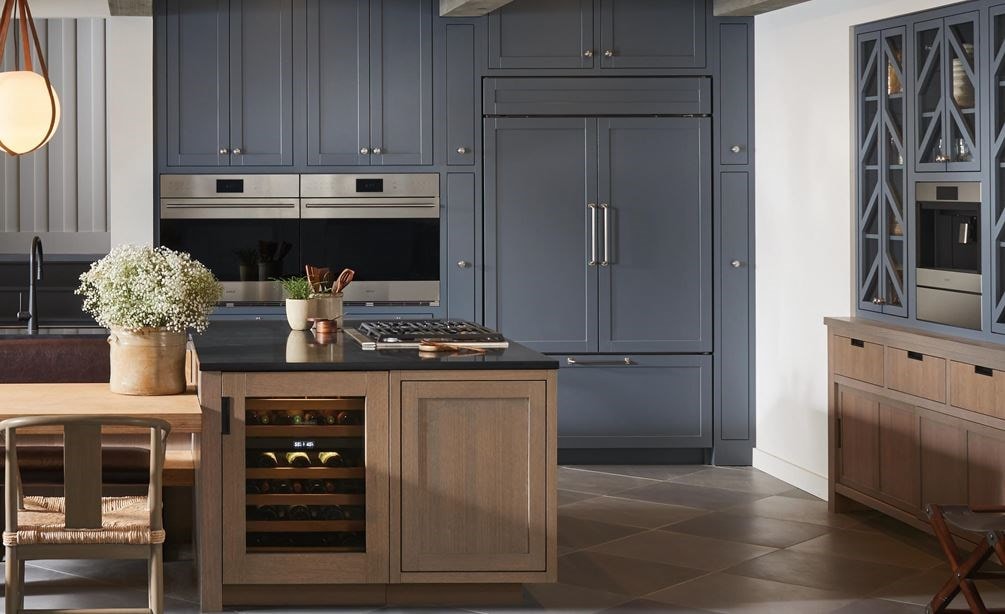 Sub-Zero and Wolf appliances incorporated into a remodeled modern cottage kitchen