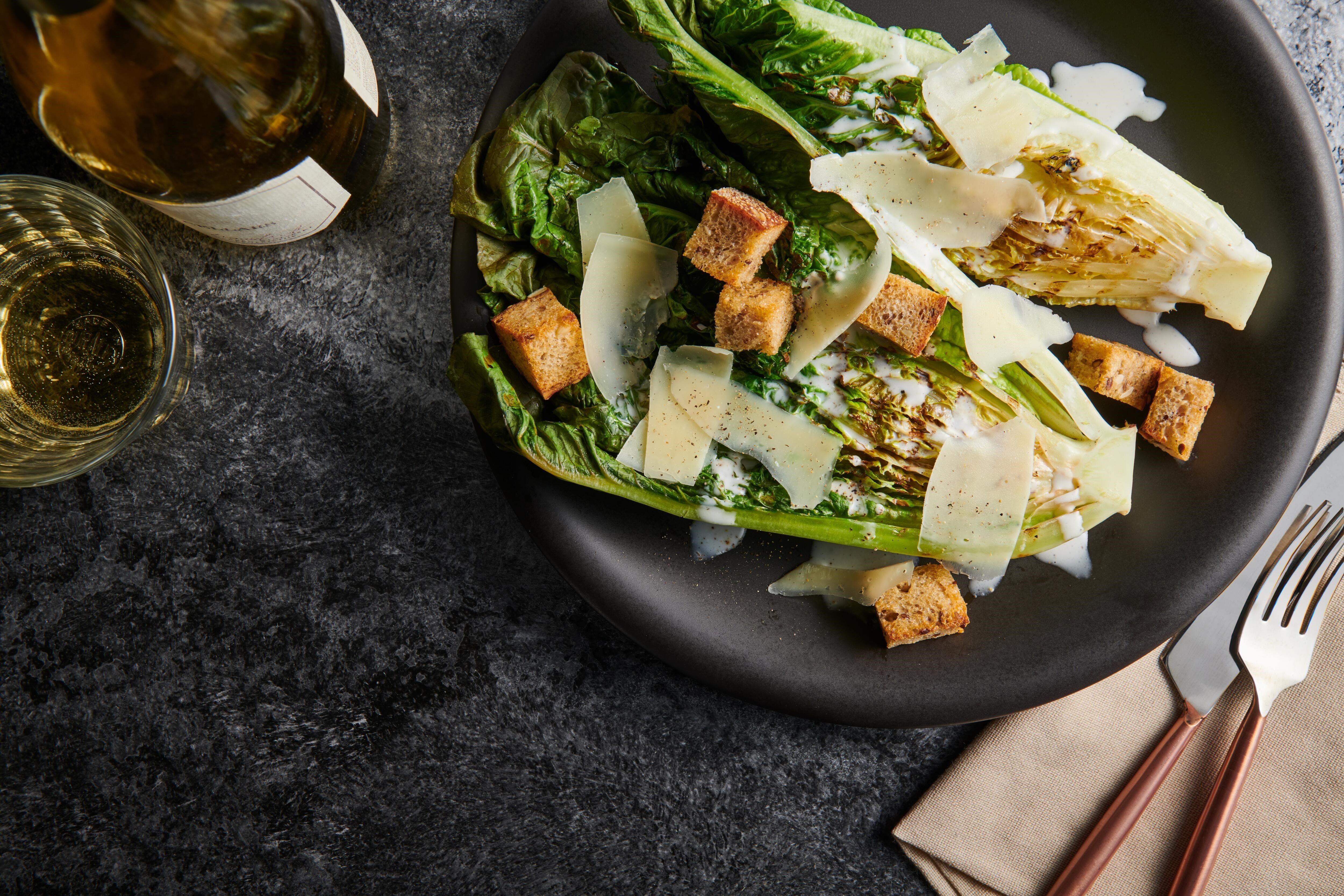 Easy and delicious Grilled Ceasar Salad recipe using the Charbroiler Mode setting of your Wolf Dual Fuel Range