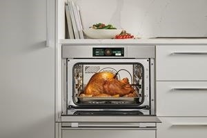 Wolf E Series Transitional Convection Steam Oven (CSOP2450TE/S/T) shown taking all of the guesswork out of cooking thanks to intelligent gourmet cooking modes.