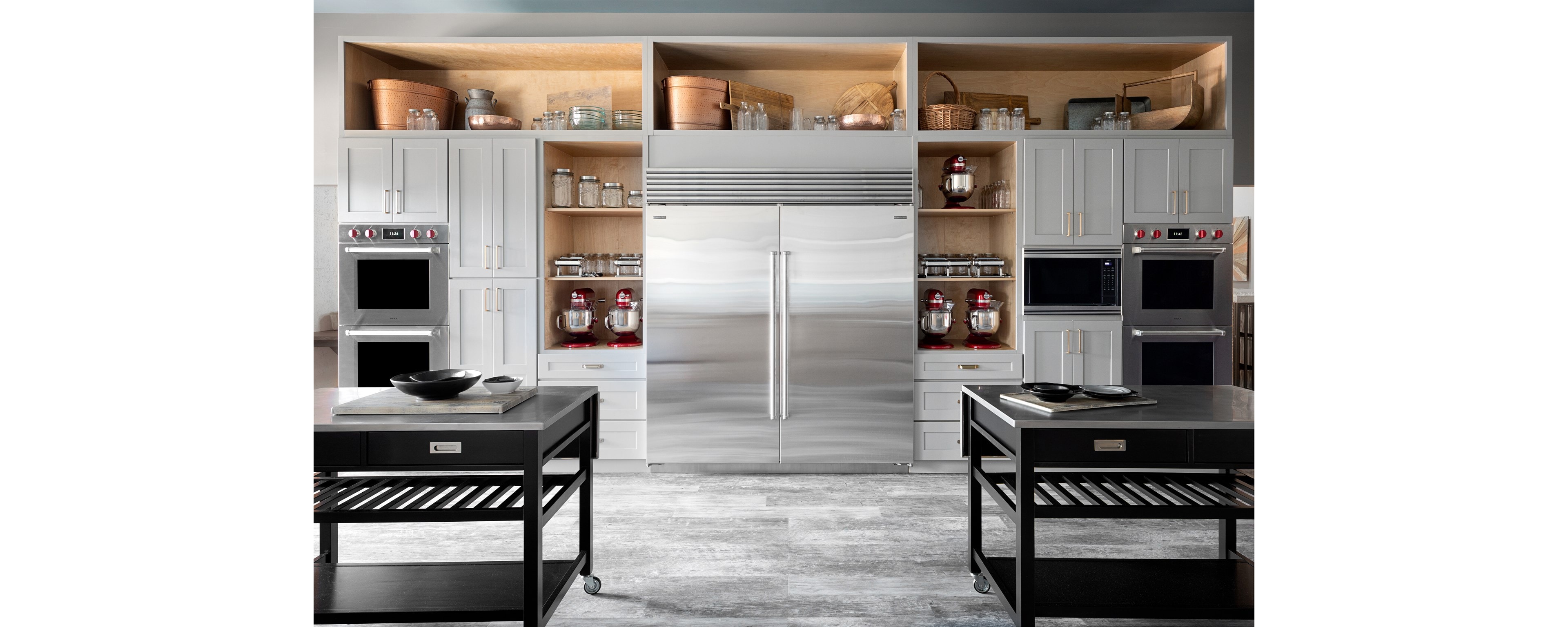 Professional Kitchen Design featuring Sub-Zero Refrigerators and Wolf Wall Ovens and Wolf Microwave