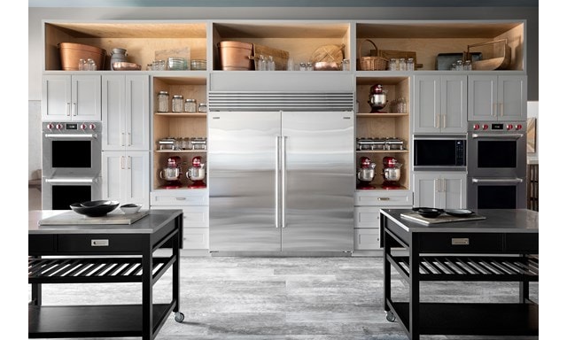 Professional Kitchen Design featuring Sub-Zero Refrigerators and Wolf Wall Ovens and Wolf Microwave