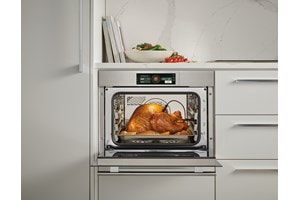 Wolf E Series Transitional Convection Steam Oven (CSOP2450TE/S/T) shown taking all of the guesswork out of cooking thanks to intelligent gourmet cooking modes.