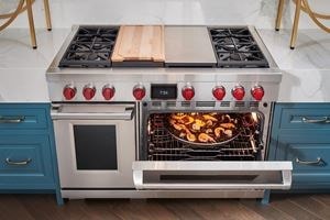 Wolf 48" dual fuel range with 4 burners, infrared charbroiler and infrared griddle