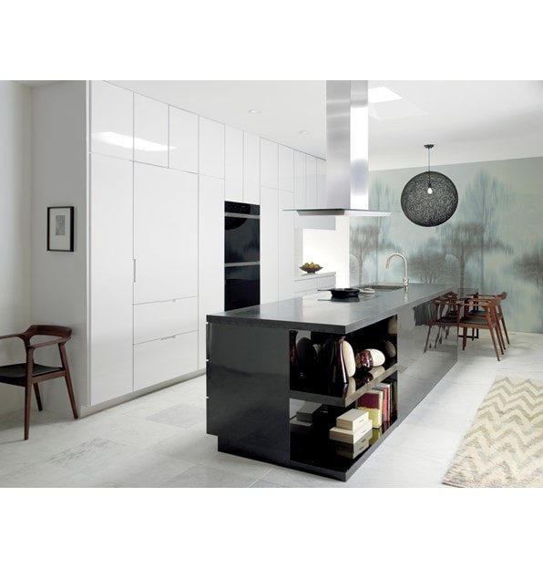 Wolf 30" Contemporary Induction Cooktop (CI304C/B) featured in large open kitchen with sleek smooth eat in granite island