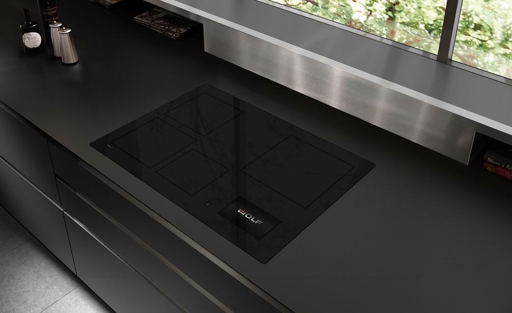 Wolf 30" Contemporary Induction Cooktop (CI30460C/B) aerial view captures the luxurious sleek black diamond glass surface.